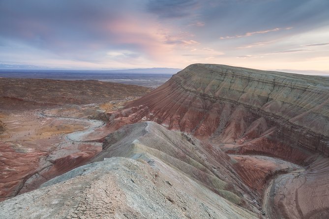 Altyn Emel. Singing dune and Aktau mountains 2 days tour - Hearing the Singing Dune at Singing Barkhan