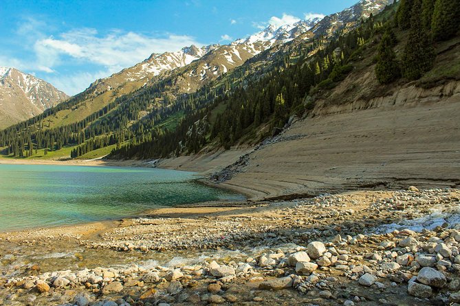Medeu and Shymbulak + Big Almaty Lake and Falcon show (Private day-tour) - Riding the cable car at Shymbulak